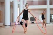 Gymnast performing an exercise with hoops