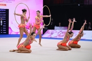 Group team gymnasts from St. Petersburg during an exercise with hoops and balls