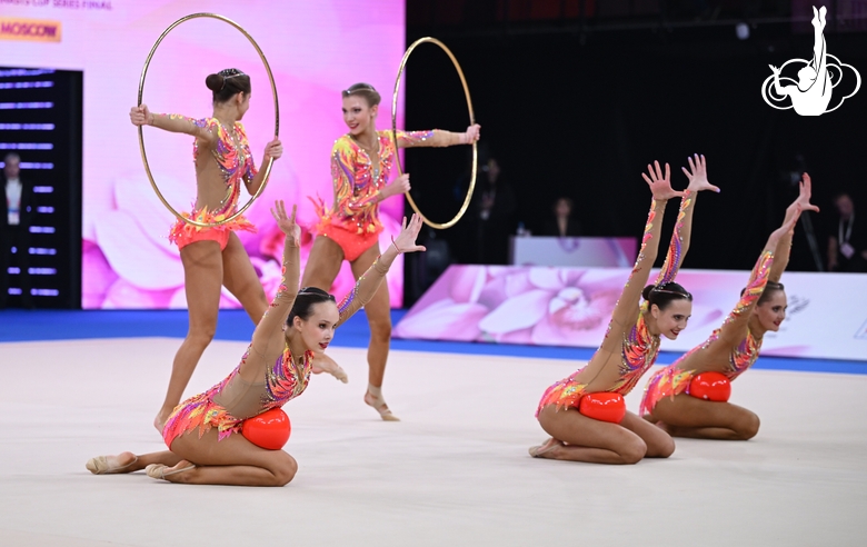 Group team gymnasts from St. Petersburg during an exercise with hoops and balls