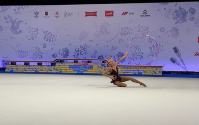 lina Kabaeva was on hand during training and offered advice to Eva Kononova and coach Evgeniya Eliseeva on how to improve her hoop technique