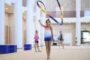 Gymnast from Novosibirsk during training at the Academy