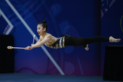 Mikayla Angeline Yang during an exercise with clubs