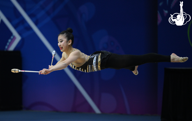 Mikayla Angeline Yang during an exercise with clubs