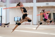 Gymnast performing an exercise with hoops