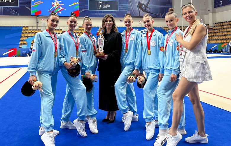 June 22, 2024. Olympic champion Alina Kabaeva with group juniors from the Zhemchuzhina Rhythmic Gymnastics Center and their coach Ksenia Timoshina after winning the BRICS Games!