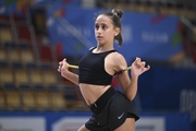 Gymnast during an exercise with clubs during mat testing before the BRICS Games