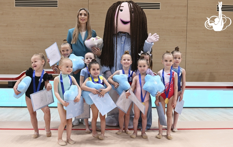 Academy coach Olga Frolova with young gymnasts at the mAlinka tournament