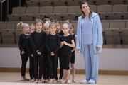 Academy coach Olesya Kovaleva with young gymnasts during training