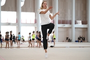Coach Alina Protasova during practice at the training camp in the Academy