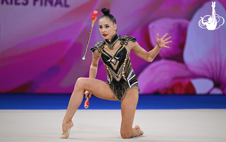 Mariia Borisova during an exercise with clubs