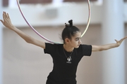 Anna Vakulenko during an exercise with a hoop during training at the Academy