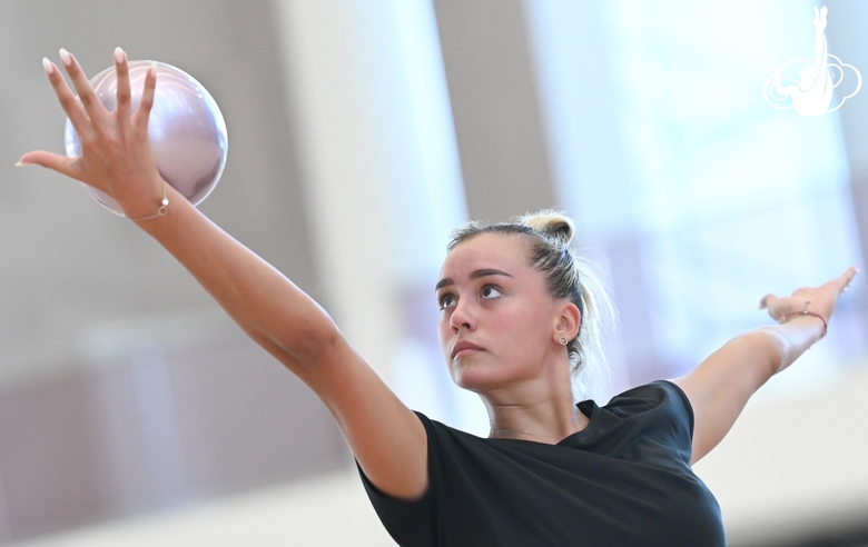 Maria Pobedushkina performs an element with a ball