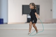 Young gymnast during training