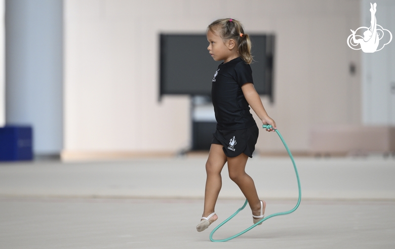 Young gymnast during training