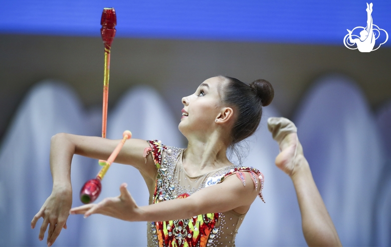 Mariia Borisova (Russia) doing an exercise with clubs