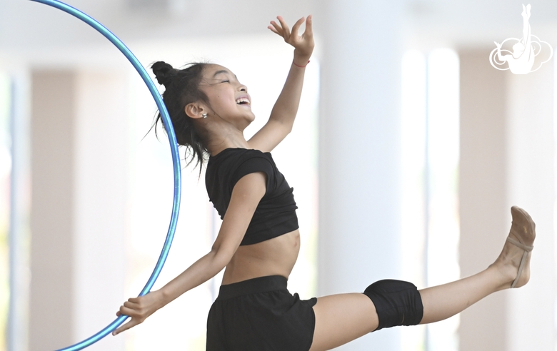 Asel Arapova  during an exercise with a hoop during preparation training for the BRICS Games