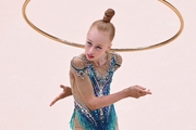 Olga Chernykh during an exercise with a hoop at an assessment training session