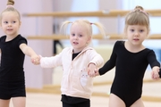 Young gymnasts during training