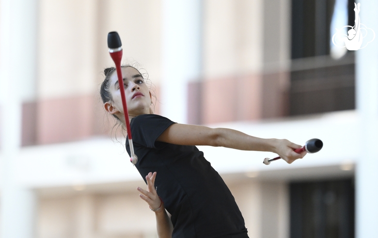 Anna Vakulenko during an exercise with clubs