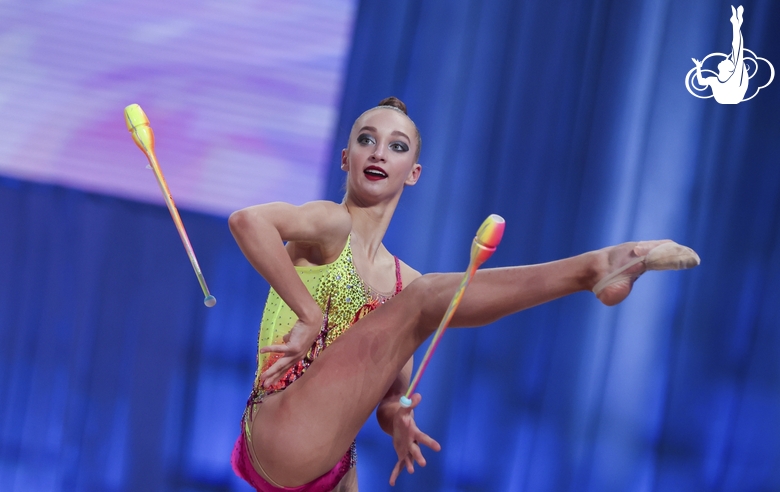 Diana Chugunikhina during an exercise with clubs