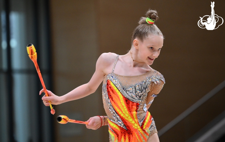 Lada Yakovleva during an exercise with clubs  during a control training session