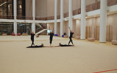 What did Olympic champion Alina Kabaeva say to Polina Zakharova during the clubs exercise practicing?