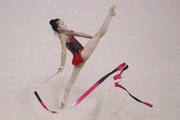 Mi Wenxinyue (Китай) doing an exercise with a ribbon