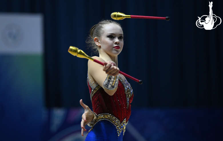 Vera Tugolukova during an exercise with clubs