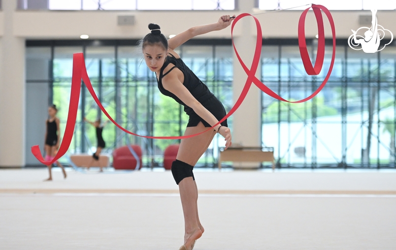 Mariia Borisova  during an exercise with a ribbon during training at the Academy