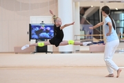 Academy coach Elizaveta Chernova and  Gymnast from Belgorod during class