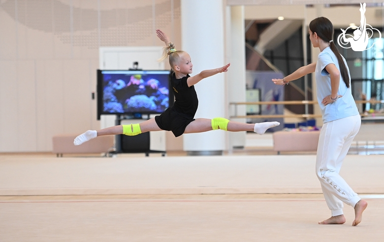 Academy coach Elizaveta Chernova and  Gymnast from Belgorod during class