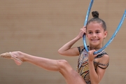 Sabina Samatova during an exercise with a hoop at an assessment training session