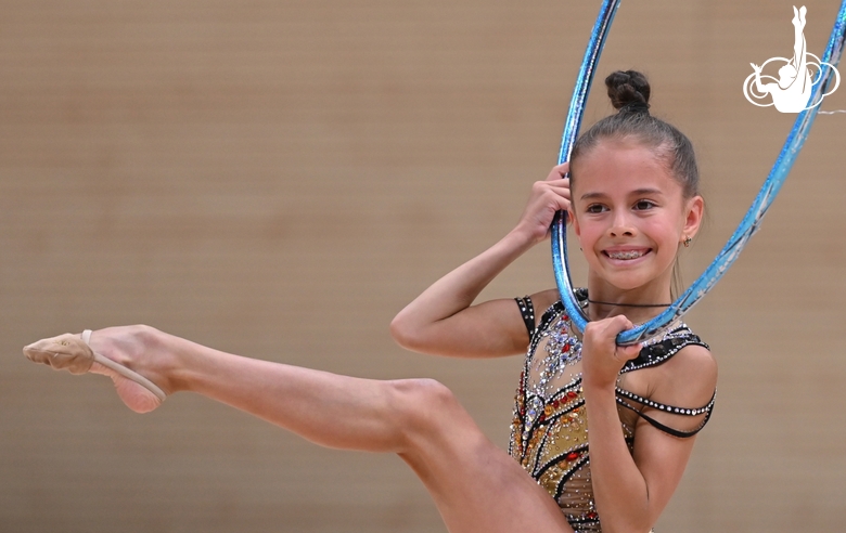 Sabina Samatova during an exercise with a hoop at an assessment training session