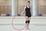 Mariia Borisova during an exercise with a hoop during training at the Academy