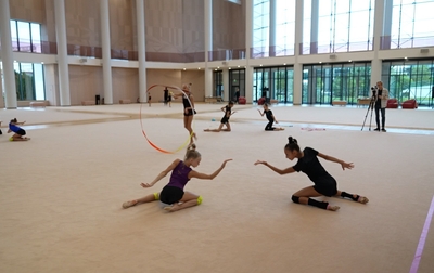The Olympic champion helps athletes improve not only their competition programs, but also their exhibition performances