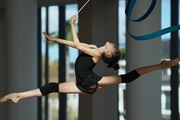 Valeria Medvedeva during an exercise with a ribbon