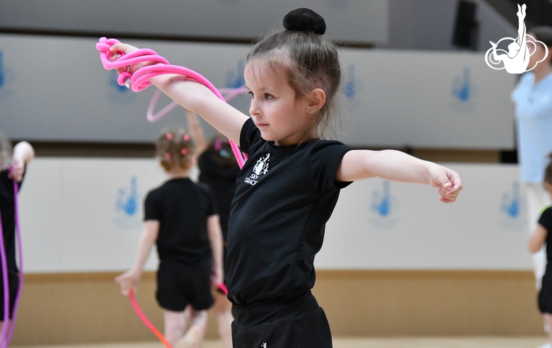 Young gymnast during training