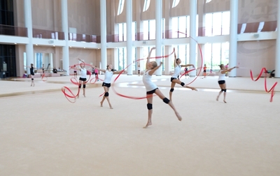How can a routine be made more fluid and harmonious?
