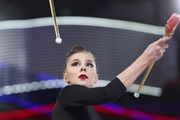 Мария Борисова во время упражнения с булавами на опробовании