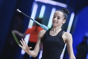 Isabella Rojas during an exercise with clubs at floor testing