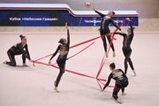 Gymnasts during an exercise with balls and ribbons