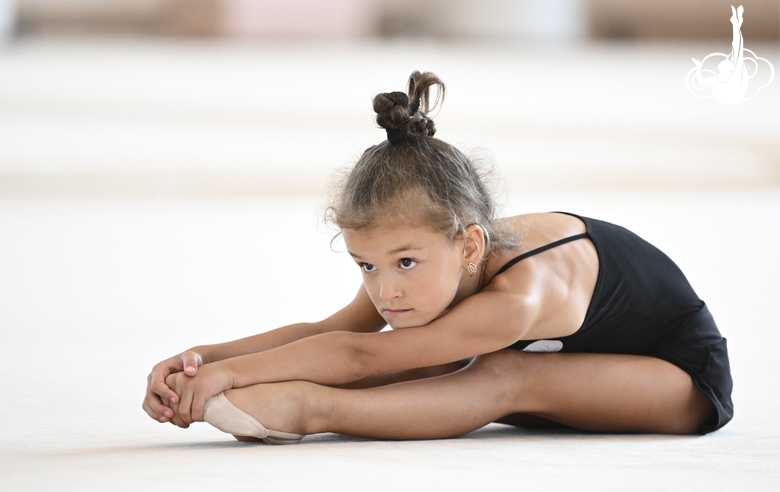 Young gymnast during training