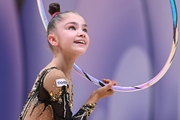 Ksenia Savinova during an exercise with a hoop at the control training session