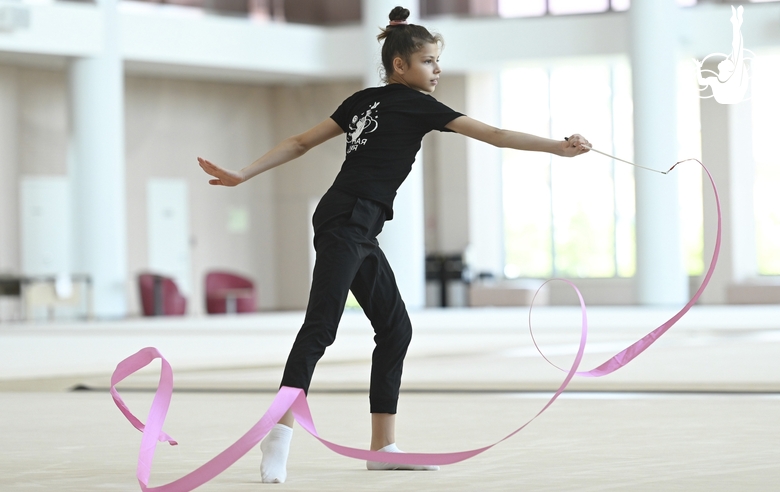 Karolina Tarasova during an exercise with a ribbon