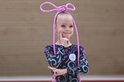 Young gymnast during an exercise with a jump rope at the mAlinka tournament