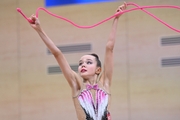 Gymnast during an exercise with a jump rope