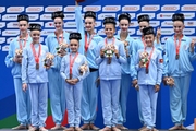 Kristina Voitenko, Ksenia Savinova, Karolina Tarasova, Asel Arapova and group exercise team members during the award ceremony at BRICS Games