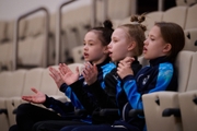 Young Academy gymnasts as spectators during a control training session at the Academy