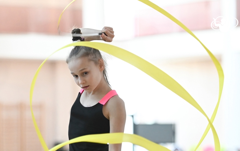 Yana Zaikina during an exercise with a ribbon