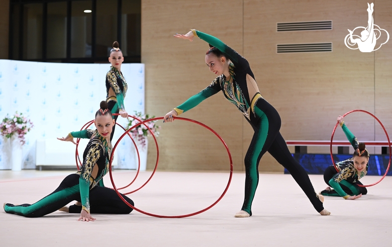 Gymnasts during an exercise with hoops